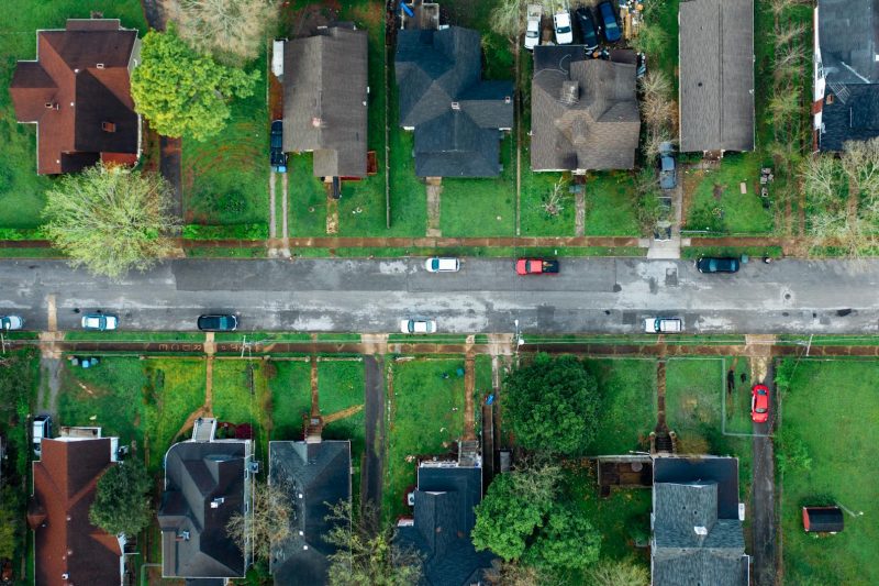 Highangle aerial shot of a suburban neighborhood street line 1781024416