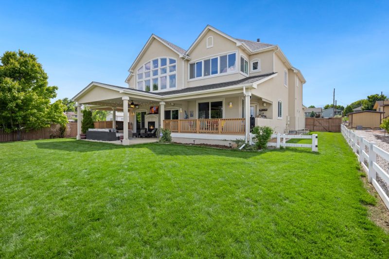 Home 144 Beautiful twostory suburban house with a large green lawn an 1783443846